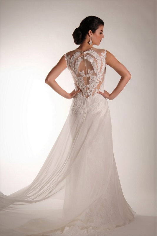 This wedding dress features a lovely lace back.