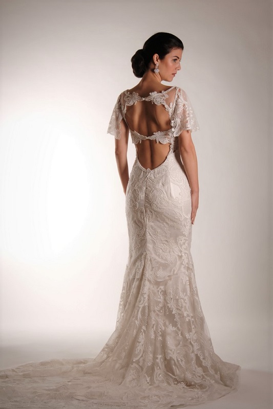 This wedding gown can have an even longer train for added drama.