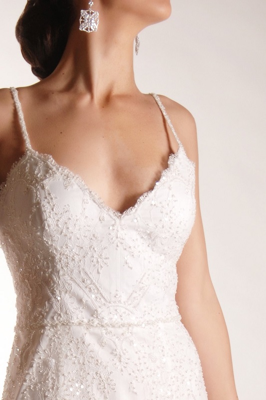 Note the beautiful beading of this lace wedding dress
