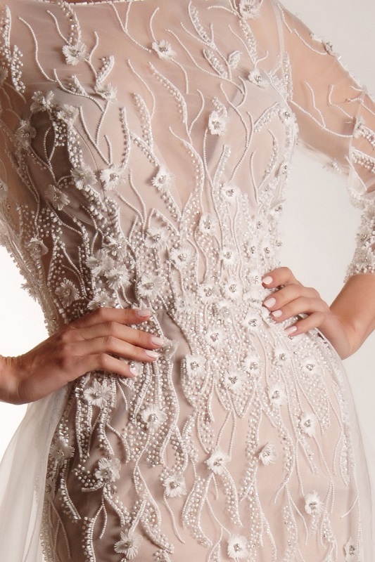 Extravagant hand made wedding dress detail.