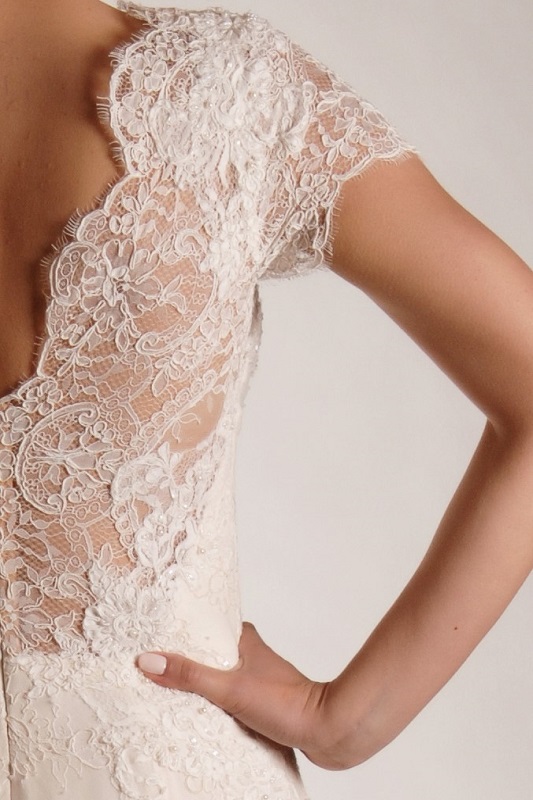 Multi layered lace work on this bridal dress.