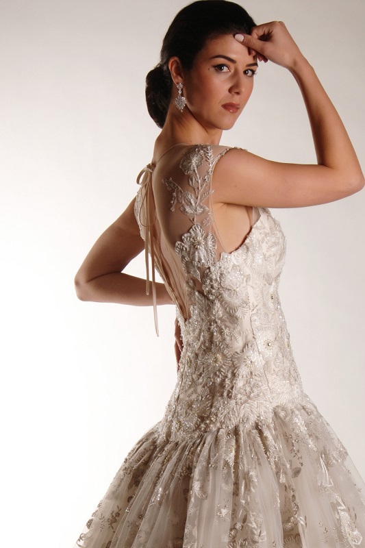 We have used an illusion top for the neckline of this bridal dress.